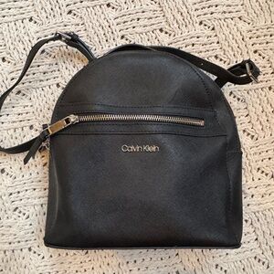 Calvin Klein Black Women's Backpack with Silver Accents